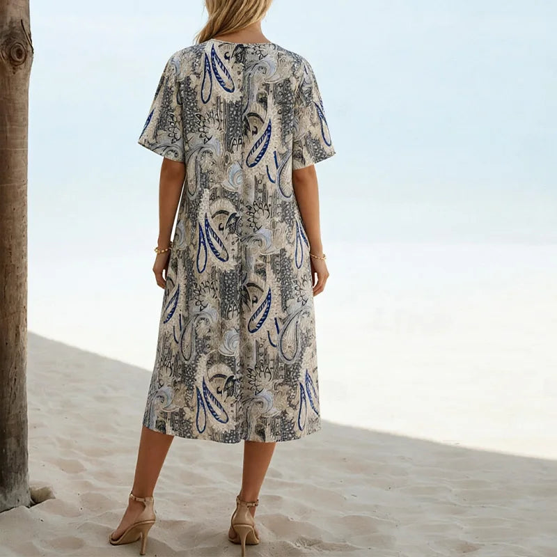 Robe midi décontractée grande taille à imprimé — col rond, manches courtes, poches pratiques