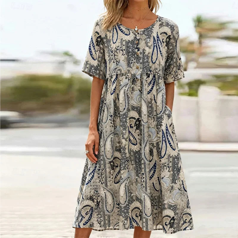 Robe midi décontractée grande taille à imprimé — col rond, manches courtes, poches pratiques